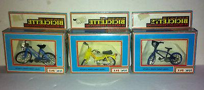 tre modellini da collezione di bicicletta in